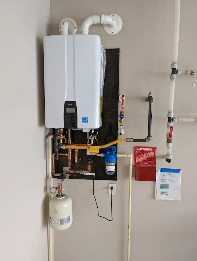 Professional plumber installing copper piping in a Butte-Silver Bow home